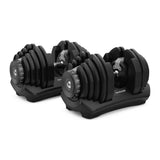 BowFlex SelectTech 1090 manualer i par på oppbevaringsbrett