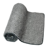 Casall Natural Wool yogamatte i grått, delvis rullet